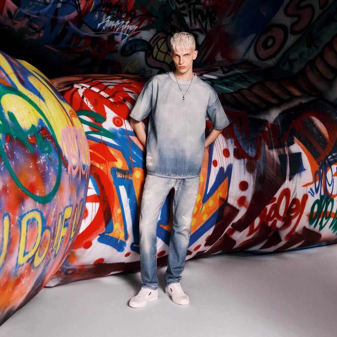 A man wearing Diesel jeans